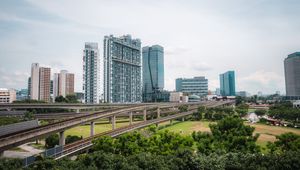 Preview wallpaper city, buildings, bridge, road, junction, trees