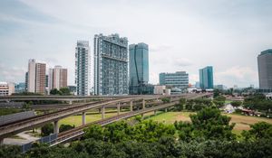 Preview wallpaper city, buildings, bridge, road, junction, trees