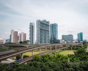 Preview wallpaper city, buildings, bridge, road, junction, trees