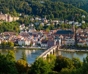 Preview wallpaper city, buildings, bridge, river, trees, aerial view