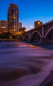 Preview wallpaper city, buildings, bridge, architecture, water, twilight