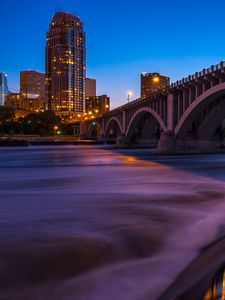 Preview wallpaper city, buildings, bridge, architecture, water, twilight