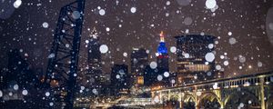 Preview wallpaper city, buildings, bridge, snow, bokeh