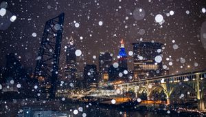 Preview wallpaper city, buildings, bridge, snow, bokeh