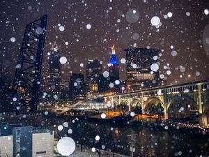 Preview wallpaper city, buildings, bridge, snow, bokeh