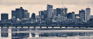 Preview wallpaper city, buildings, bridge, river, reflection, black and white