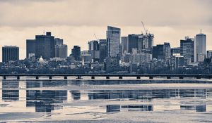 Preview wallpaper city, buildings, bridge, river, reflection, black and white