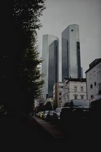 Preview wallpaper city, buildings, cars, parking, road