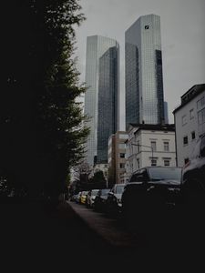 Preview wallpaper city, buildings, cars, parking, road