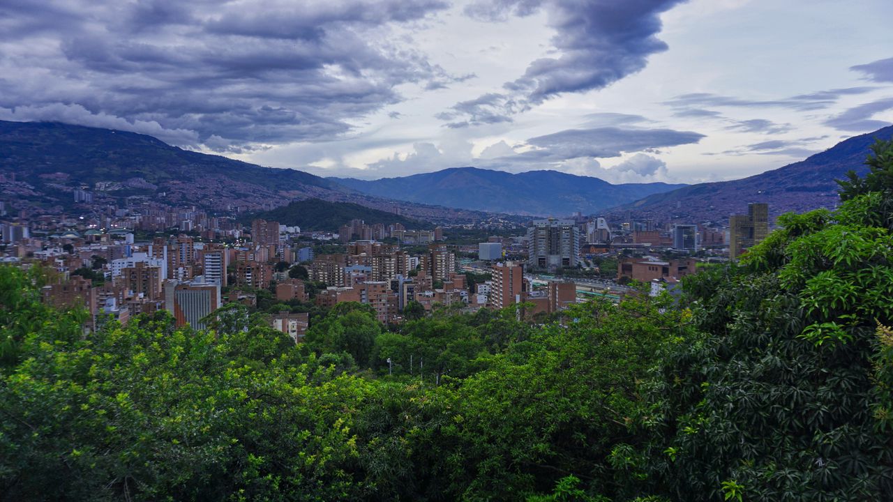 Wallpaper city, buildings, cityscape, aerial view, trees, mountains