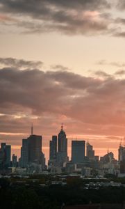 Preview wallpaper city, buildings, clouds, sunset