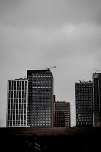 Preview wallpaper city, buildings, clouds, architecture