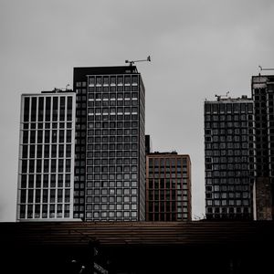 Preview wallpaper city, buildings, clouds, architecture