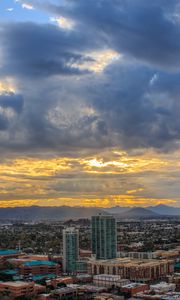 Preview wallpaper city, buildings, clouds, cityscape, aerial view