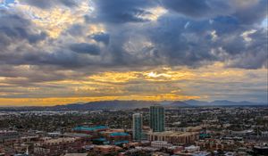 Preview wallpaper city, buildings, clouds, cityscape, aerial view