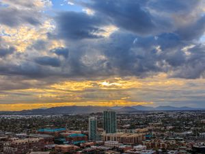 Preview wallpaper city, buildings, clouds, cityscape, aerial view