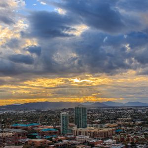 Preview wallpaper city, buildings, clouds, cityscape, aerial view