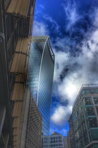 Preview wallpaper city, buildings, clouds, distortion, bottom view