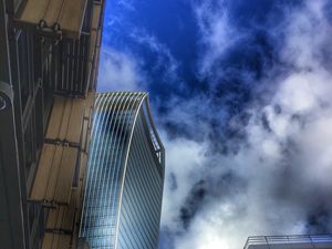 Preview wallpaper city, buildings, clouds, distortion, bottom view