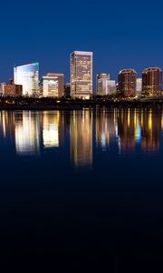 Preview wallpaper city, buildings, coast, water, reflection