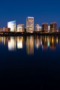 Preview wallpaper city, buildings, coast, water, reflection