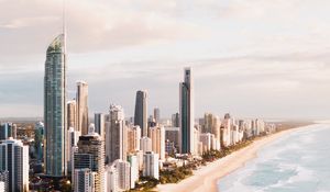 Preview wallpaper city, buildings, coast, beach, sea