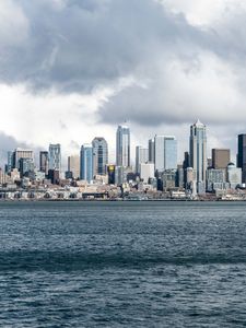 Preview wallpaper city, buildings, coast, water, waves