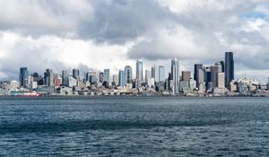 Preview wallpaper city, buildings, coast, water, waves