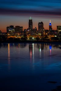 Preview wallpaper city, buildings, coast, lights, reflection, night