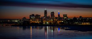 Preview wallpaper city, buildings, coast, lights, reflection, night