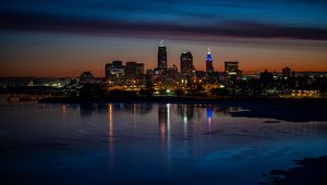 Preview wallpaper city, buildings, coast, lights, reflection, night