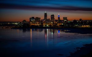 Preview wallpaper city, buildings, coast, lights, reflection, night