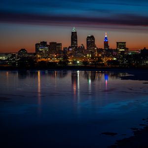 Preview wallpaper city, buildings, coast, lights, reflection, night