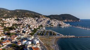 Preview wallpaper city, buildings, coast, water, aerial view