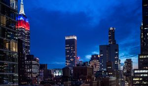 Preview wallpaper city, buildings, evening, road
