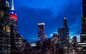 Preview wallpaper city, buildings, evening, road