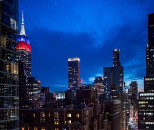 Preview wallpaper city, buildings, evening, road