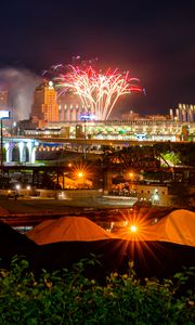 Preview wallpaper city, buildings, fireworks, sparks, night, dark