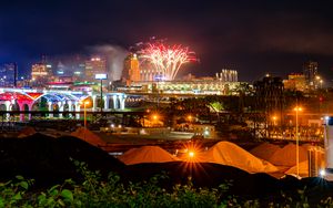 Preview wallpaper city, buildings, fireworks, sparks, night, dark