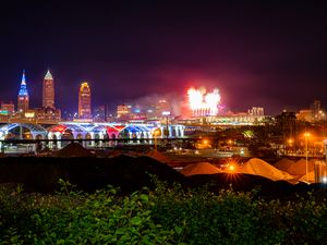 Preview wallpaper city, buildings, fireworks, sparks, dark