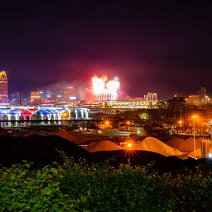 Preview wallpaper city, buildings, fireworks, sparks, dark