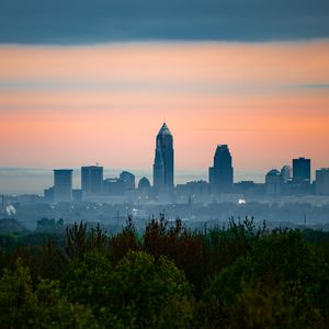 Preview wallpaper city, buildings, fog, panorama, architecture, view, trees