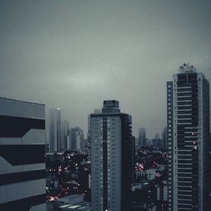 Preview wallpaper city, buildings, fog, lights