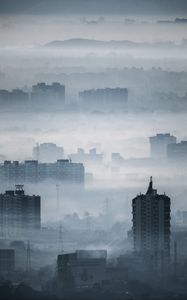 Preview wallpaper city, buildings, fog, aerial view, illusion