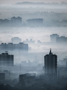 Preview wallpaper city, buildings, fog, aerial view, illusion