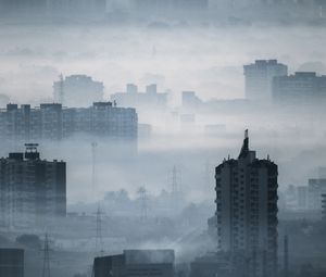 Preview wallpaper city, buildings, fog, aerial view, illusion