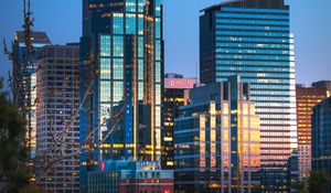 Preview wallpaper city, buildings, glass, reflection, trees
