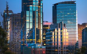Preview wallpaper city, buildings, glass, reflection, trees