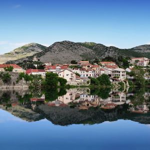 Preview wallpaper city, buildings, lake, reflection, sky