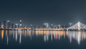 Preview wallpaper city, buildings, lake, lights, reflection, night, dark